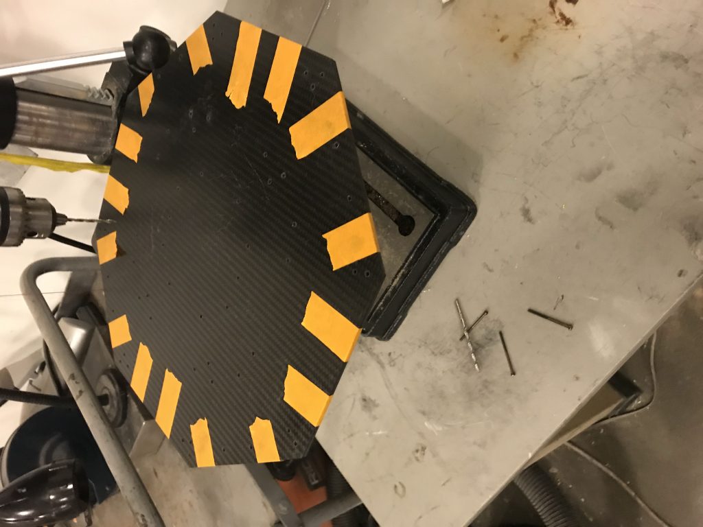 Carbon fiber baseplate being drilled